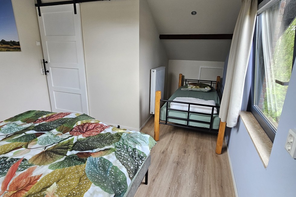 Slaapkamer boven vakantiehuis.jpg